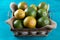 Orange fruit in the basket. Tropical fruits. Copy space