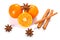 Orange fruit, cinnamon sticks and anise stars