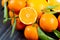 Orange fruit and fresh tangerines oranges on wood