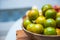 Orange fruit on the wooden bowl