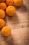 Orange fruits with organized copyspace on wooden