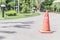 Orange funnel on the road sign drive be careful.