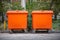 Orange garbage bins