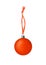 Orange glass ball hanging on ribbon on white background isolated close up, red Ð¡hristmas tree decoration, shiny round bauble