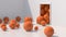 Orange glossy balls falling and rolling. White room, hard light. Abstract illustration, 3d render.