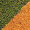 Orange and green lentils background