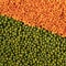 Orange and green lentils background