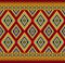 Orange Green Symmetry Geometric Ethnic Seamless Pattern on Red Background