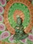 Orange/green tapestry with Buddha- enlightened one... meditation reflection, peace, tranquility, harmony