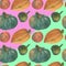 The orange and greenery pumpkins seamless watercolor pattern background with the natural paper texture.
