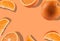 Orange with halves and slices on orange background with copy space for text or images. Fruit with mellow flesh. Close-up