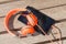 Orange headphones and tablet pc