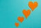 Orange hearts on a blue background