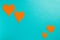 Orange hearts on a blue background