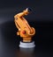 Orange heavyweight robotic arm on black background