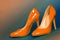 Orange high heels shoes