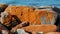 Orange-hued granite rocks in Bay of Fires