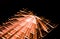 Orange Illuminated Keyboard, Light Trails Around Enter Key, Black Background