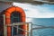 Orange inflatable lifeboats on ferry deck for emergencies and maritime accidents. Rescue boat, raft on the roof of a ferry.  Life