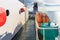 Orange inflatable lifeboats on ferry deck for emergencies and maritime accidents. Rescue boat, raft on the roof of a ferry.  Life