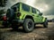 Orange Jeep Rock Crawling