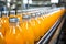 Orange juice factory production line farm plastic bottles glass tasty drink vegan vegetarian sugary healthy organic