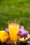 Orange juice, flowers and fruits