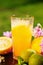 Orange juice, flowers and fruits