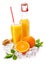 Orange juice in glass and bottle. Fresh orange fruits