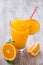 Orange Juice in Glass With Heart Straw