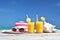 Orange juice, hat, sunglasses and conch on the tropical beach