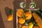 Orange juice and oranges on the table