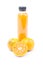 Orange juice in plastic bottle and ripe shogun orange