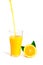 Orange juice pouring into glass with orange slice and leaf