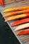 Orange Kayaks Lined Up on the Dock