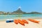 Orange kayaks on white sand beach, Bora Bora, Tahiti, French Pol