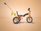 Orange kids bike with telescopic handle side view 3d render on orange background with shadow
