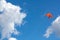 Orange kite in the sky