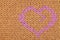 Orange knitting pattern with heart