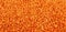 Orange lentil lens close up background