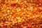 Orange lentils macro background