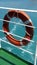 Orange Lifebelt on Cruise Ship Railings