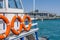 Orange lifebuoys on a pleasure boat