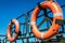 Orange lifeline on the deck of the boat