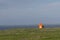 Orange lighthouse in Western part of Iceland