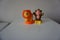 Orange lion and brown monkey plastic toys