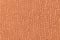 Orange luffy background of soft, fleecy cloth. Texture of textile closeup
