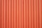 Orange metal corrugated wall