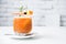 Orange mint soda mocktail with fresh orange.Soft focus of fresh mocktail drink in vintage coffee shop.Traditional summer drink