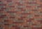 Orange mixed color brick wall background